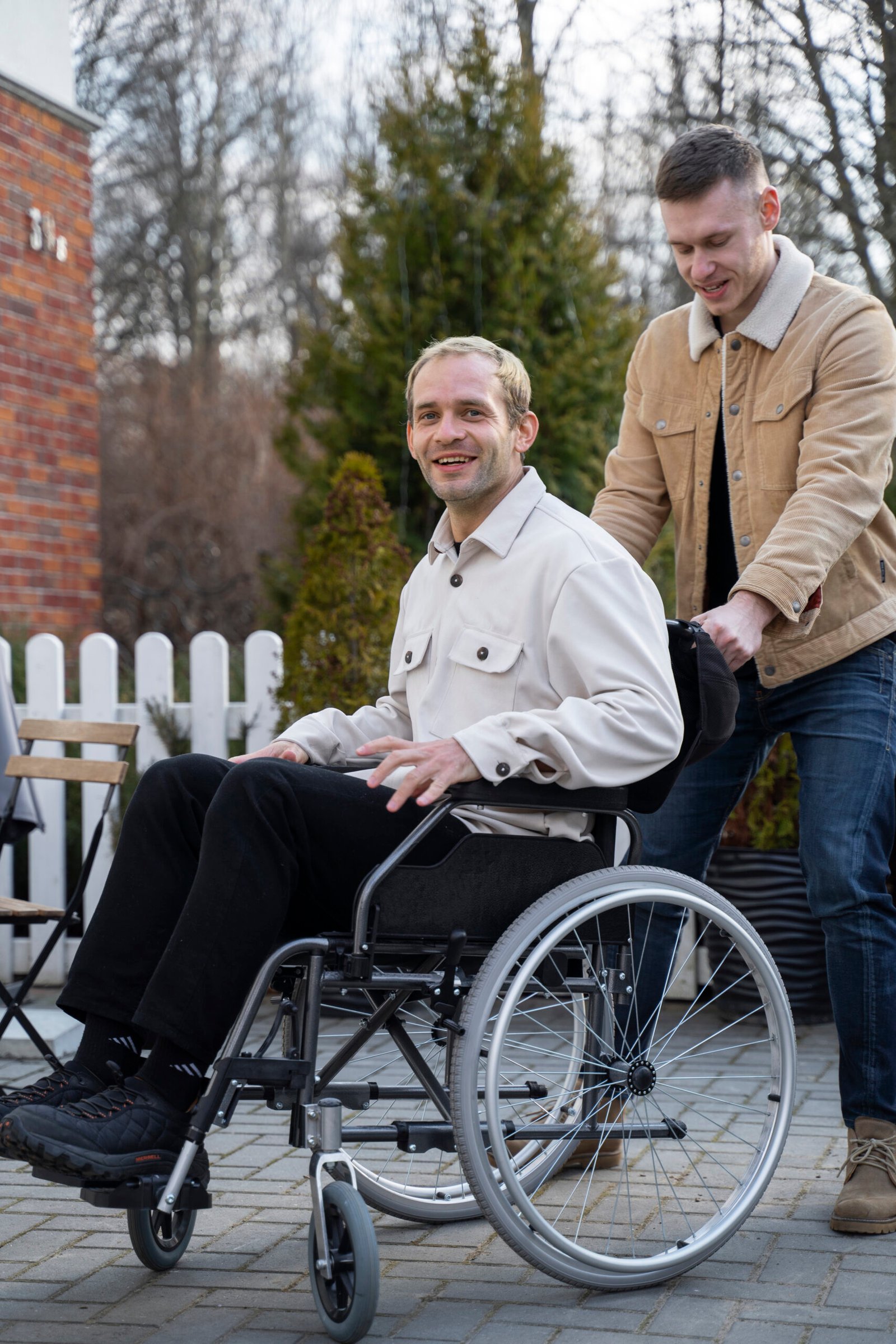 full shot man helping disabled friend